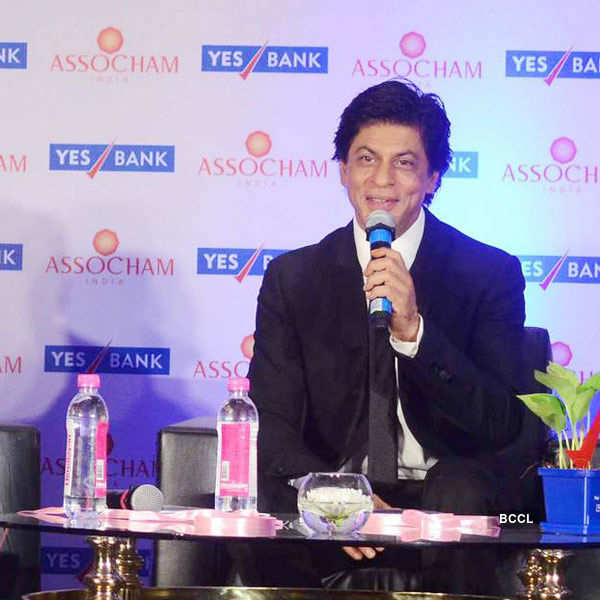 SRK unveils ASSOCHAM coffee table book