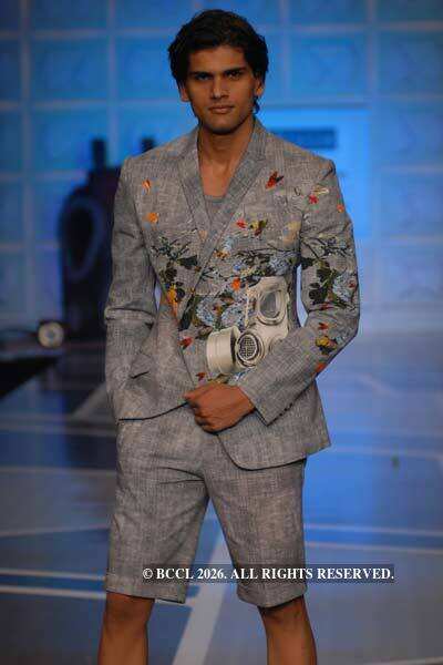 A model displays a creation by designers Rohit Gandhi and Rahul Khanna ...