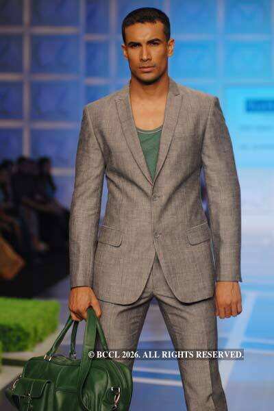A model displays a creation by designers Rohit Gandhi and Rahul Khanna ...