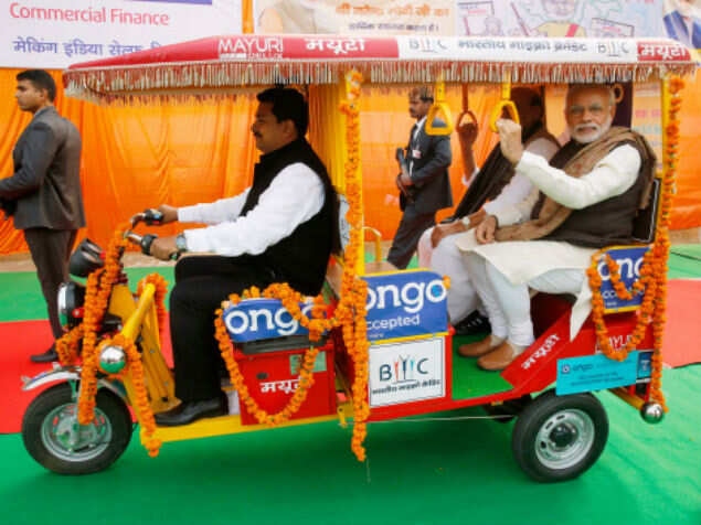 Watch: PM Modi takes e-rickshaw ride in Lucknow