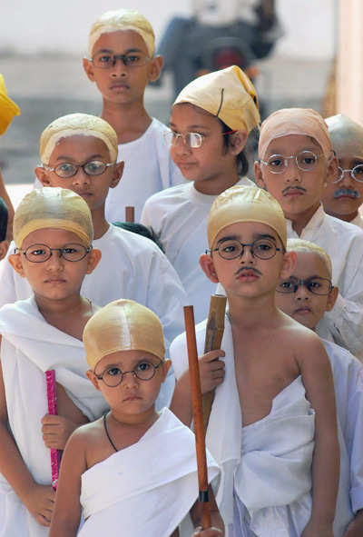 Kids dressed as Gandhiji
