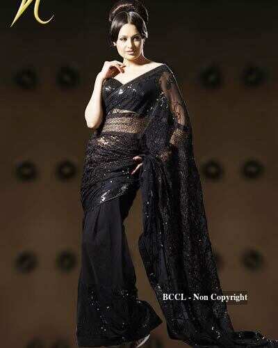 A model displays a creation by designer Neeta Lulla during Lakme ...