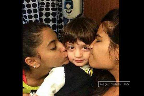 PIC: AbRam kissed by two girls!