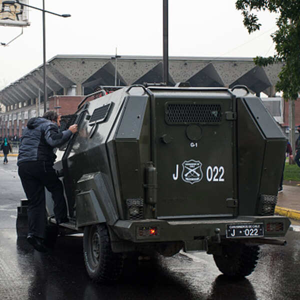 Students clash with police in Santiago