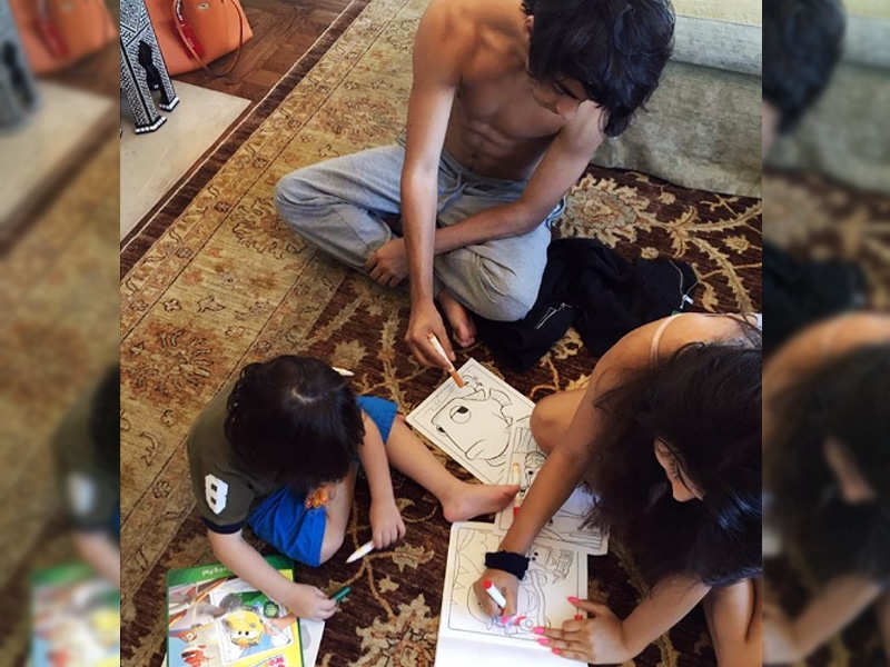 PIC: Suhana-Aryan help baby brother AbRam hone his colouring skills