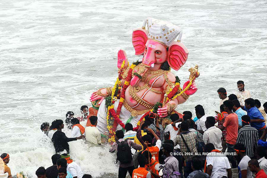 Devotees taking Ganesh idols for visarjan with great enthusiasm on