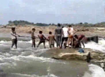 Watch: Youth trapped in river boulders rescued after 2 hours