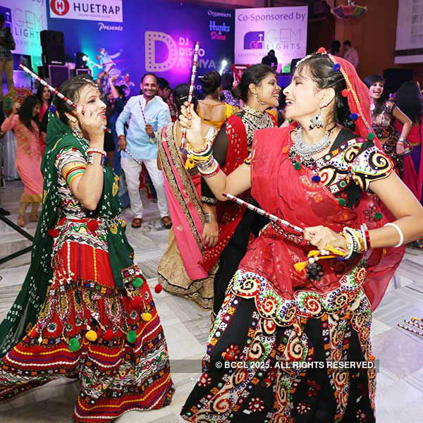 Dancers play Garba dance during the Navratri celebration at Rajasthani