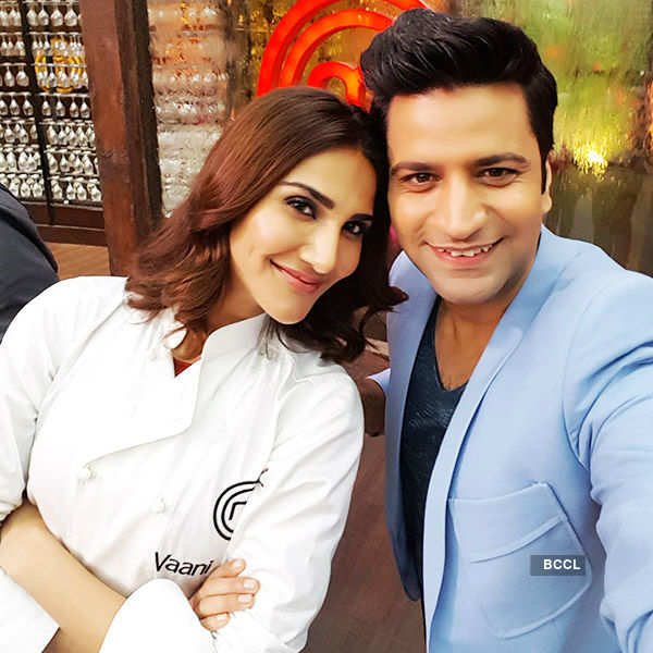 Actress Vaani Kapoor poses with Kunal Kapoor on the sets of MasterChef ...