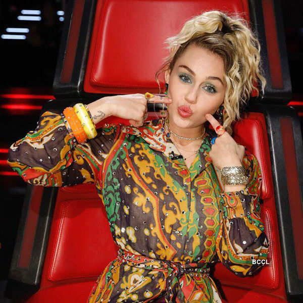 Singer Miley Cyrus performs Lakshmi puja