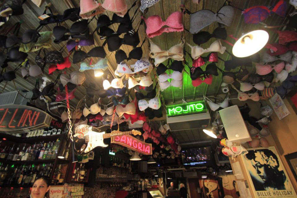 Travellers Bra's hanging from the bars ceiling - Picture of Bacaro