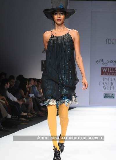 A model presents a creation by designer Pallavi Mohan on Day 2 of Wills ...