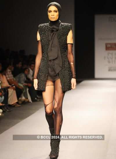 A model presents a creation by designer Prashant Verma on Day 5 of ...