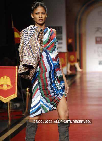 A model presents a creation by designer Ritu Beri during Wills India ...