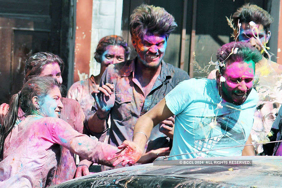 Photos: Holi revelry takes happy, ugly hues