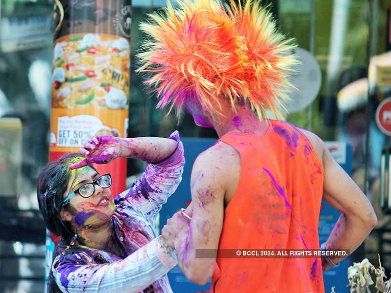 Photos: Holi revelry takes happy, ugly hues