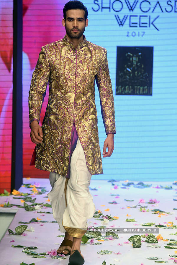 Suraj Dhalia walks the ramp for Sagar Tenali