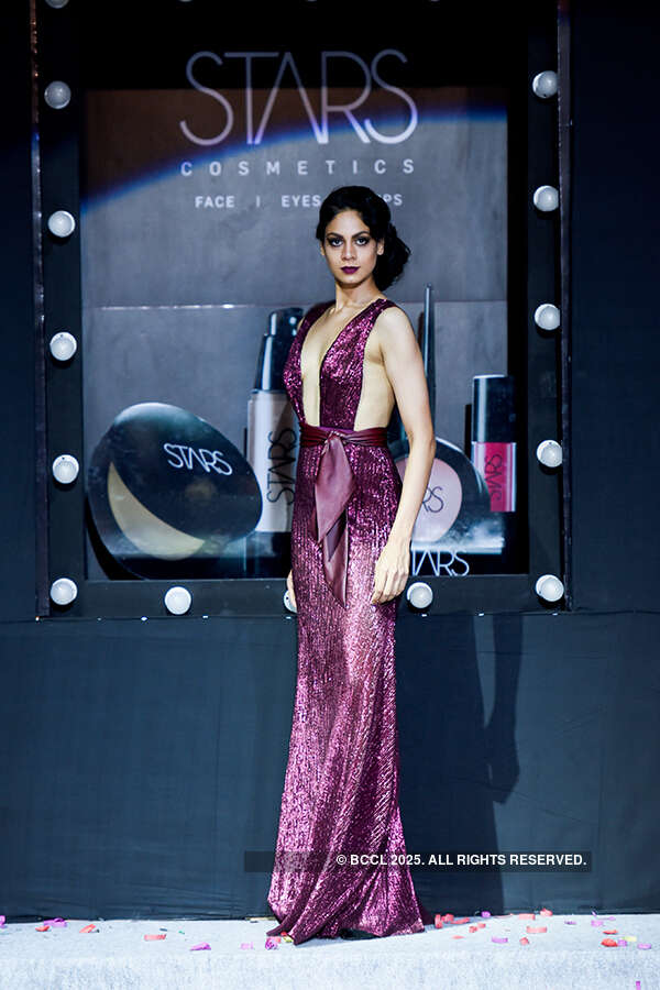 A model walks the ramp for designer Gavin Miguel