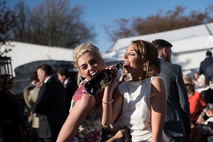 Girls go wild as the booze flows on Ladies Day at Aintree