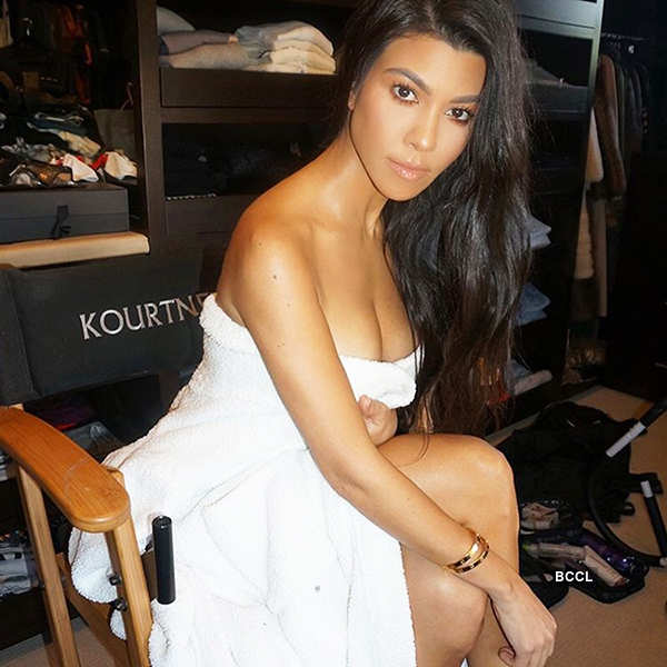 Kourtney Kardashian beats the heat in style