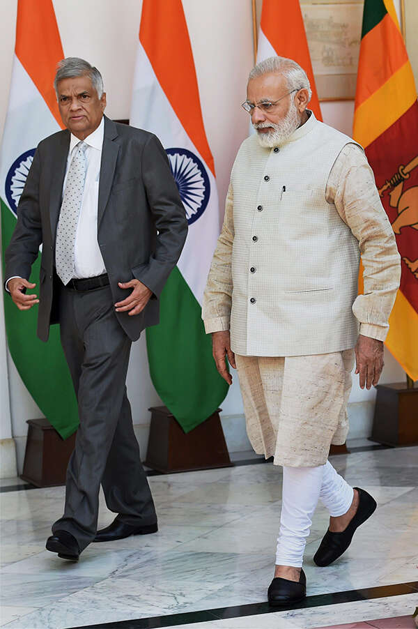 Narendra Modi and Ranil Wickremesinghe images