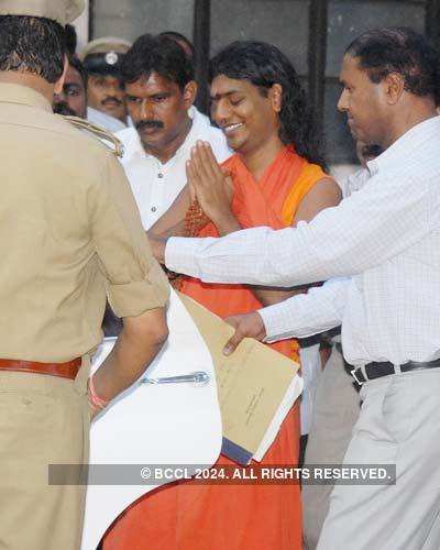 Swami produced in court