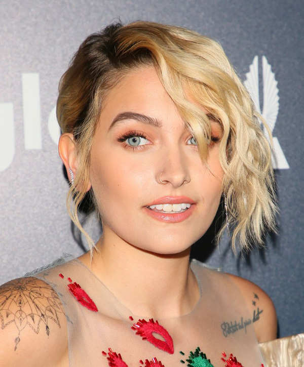 Topless Paris Jackson soaks up the sun while camping in a desert