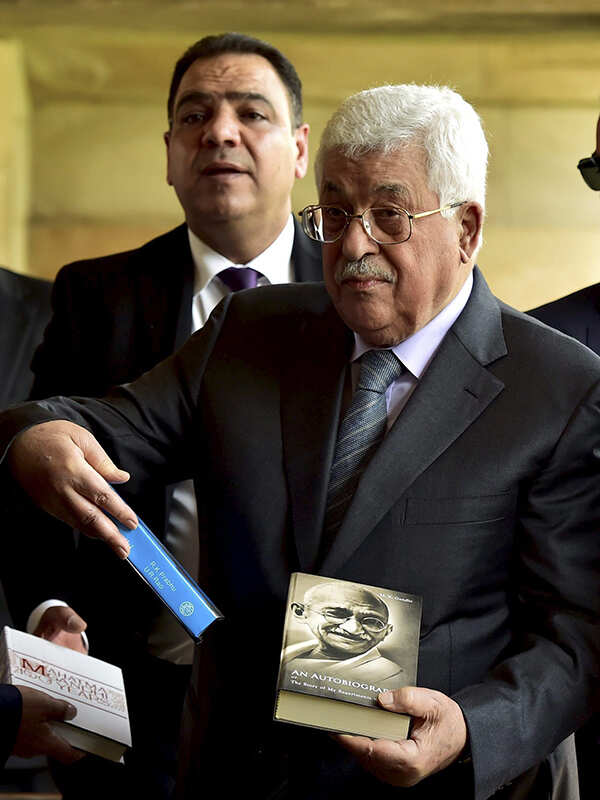 Mahmoud Abbas is presented books