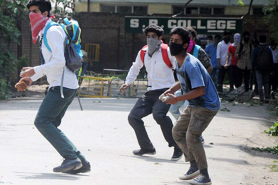 Sri Pratap Higher Secondary College (SP College) throw stones