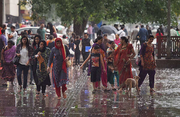 People walk at Connaught Place