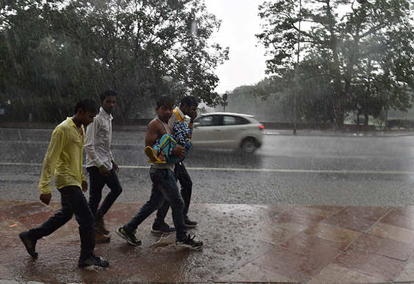 Rain brings respite from scorching heat in Delhi
