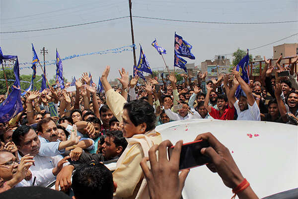 BSP supremo Mayawati waves her hand