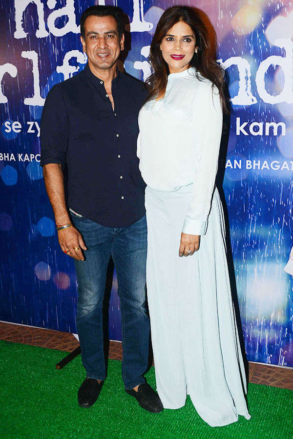 Ronit Roy poses for a photo with his wife Neelam Singh as they arrives ...