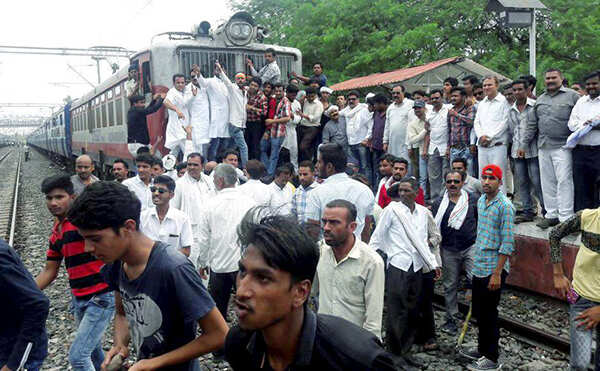 Farmers stopping train