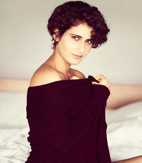 Fatima posing in black top