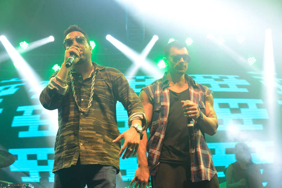 Mika Singh and Karan Singh Grover on stage
