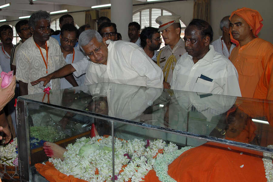A devotee pays his last respects