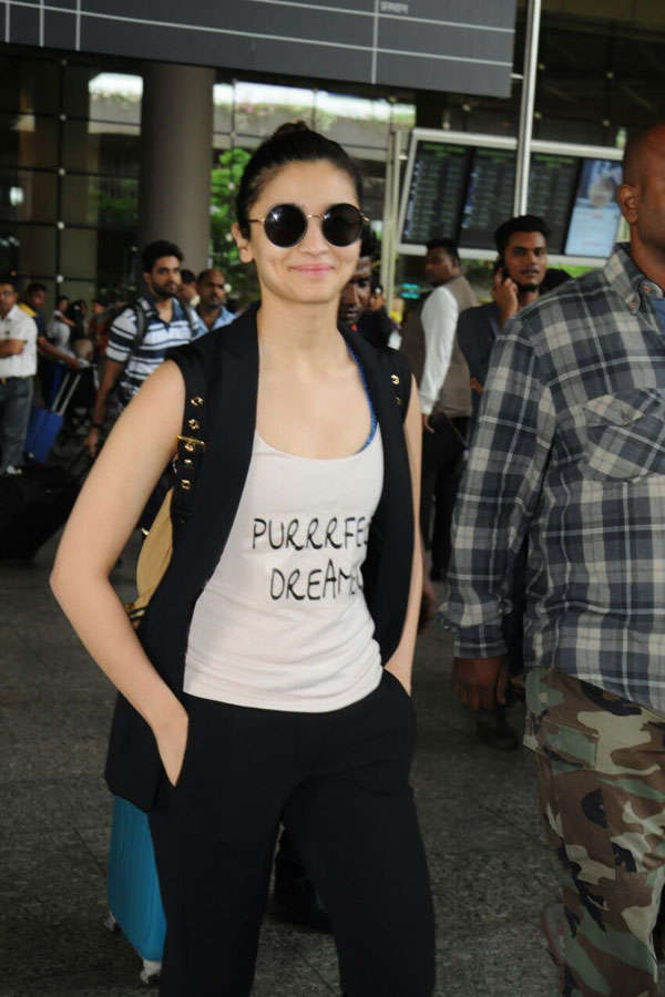 Photos of celebrities at airport