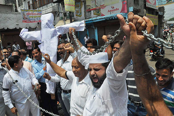 Traders shout slogans against GST