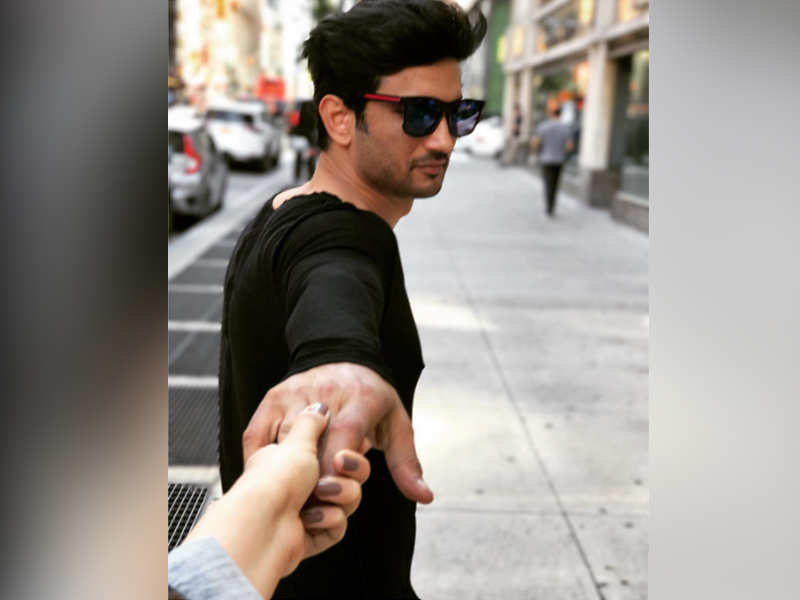 This photo of Sushant Singh Rajput with a mystery woman is sure to raise few questions