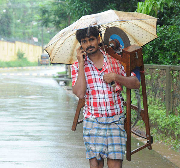 A man protects himself with an umbrella