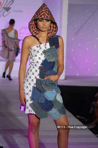 A model walks the ramp to showcase a creation during NIFT annual ...