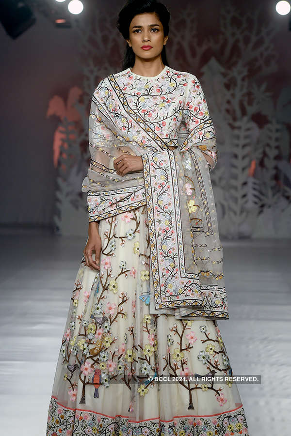 A model showcases a creation by Rahul Mishra on Day 4 of the FDCI India ...