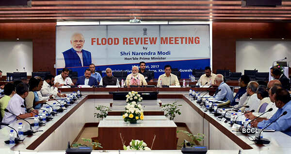 PM Modi attends a meeting to review the flood situation