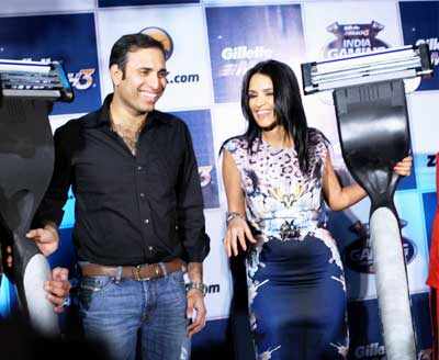 Neha Dhupia, VVS Laxman photos