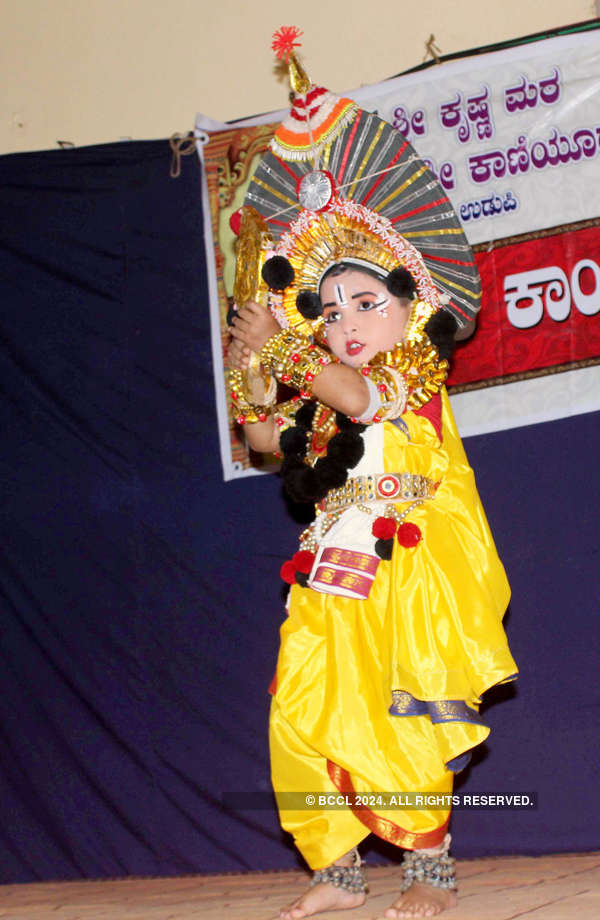 Cute kids dressed up as Lord Krishna