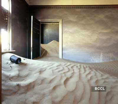 The ghost town buried in the sand