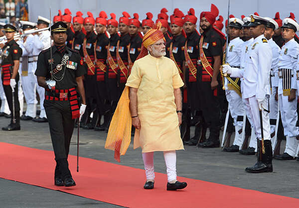 ​ PM Narendra Modi inspects a guard of honou