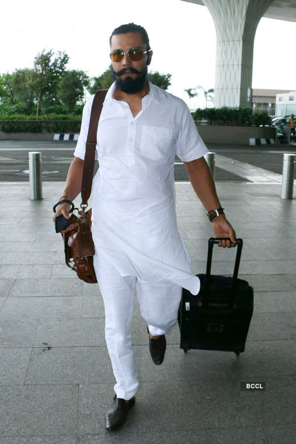 Photos of celebrities at airport