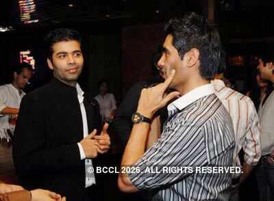Karan Johar (L) and Manish Malhotra 